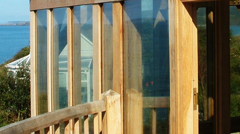 An oak framed balcony with sea views.