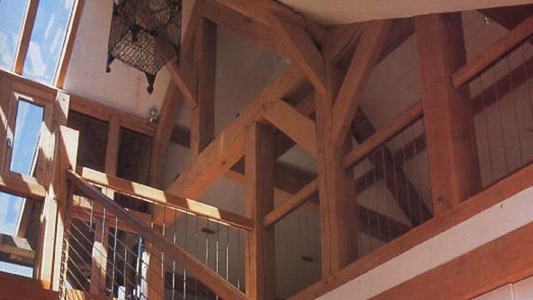 The stairwell in an oak framed house.