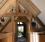 The hallway of an oak framed house.