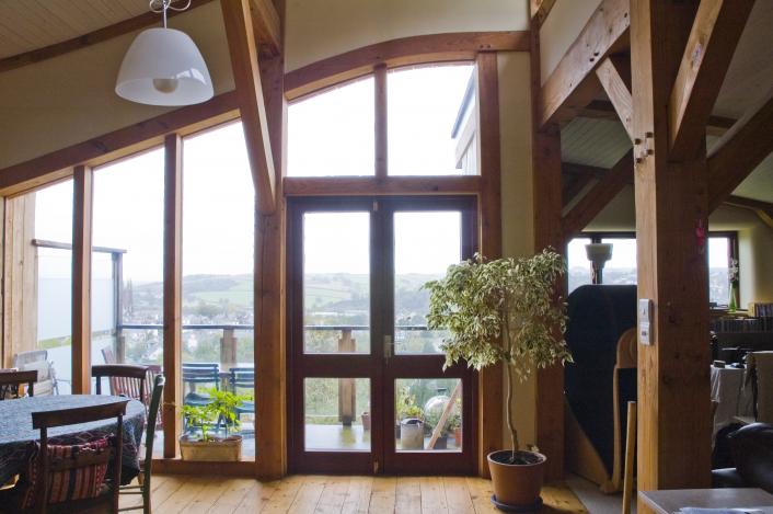 Douglas fir timbers used to create a curved roof.