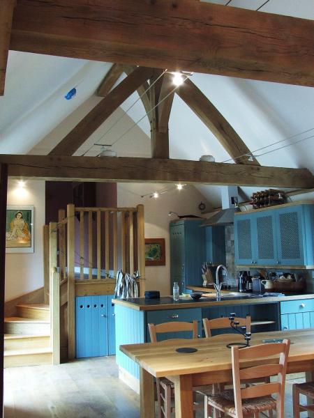 Oak trusses in the kitchen of a barn conversion.