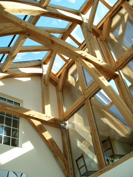 A complex oak frame with glass roof.